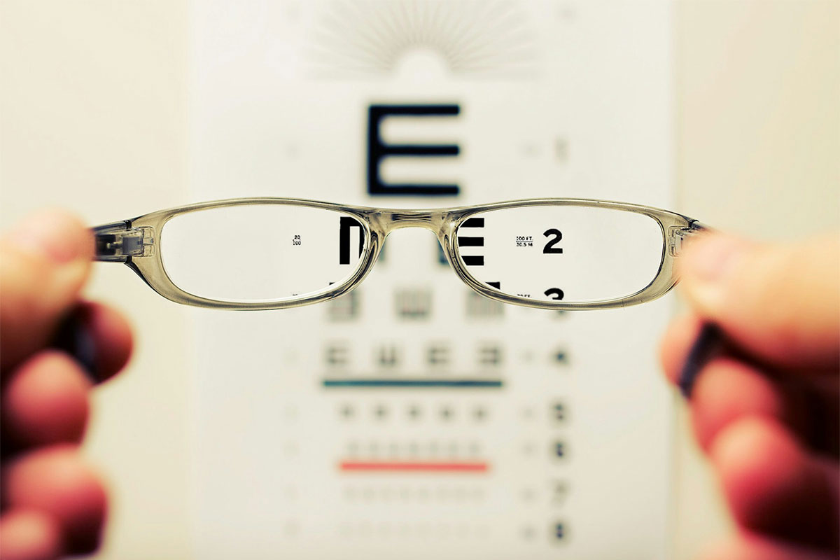 Viewing eye chart through eyeglasses