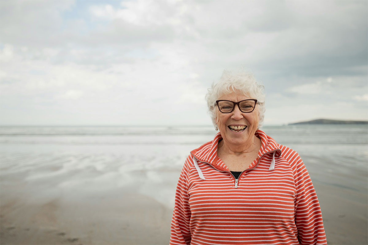 Woman wearing eyeglasses at a beach